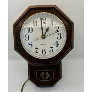 VTG Spartus Electric Wall Clock Octagon Brown Faux Woodgrain Plug In MCM Tested